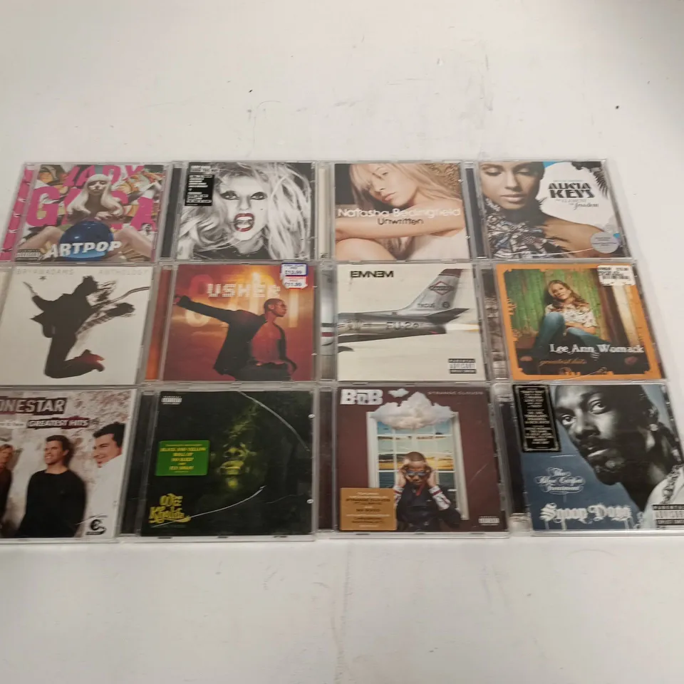 LOT OF APPROXIMATELY 55 ASSORTED CDS TO INCLUDE EMINEM, USHER, RONAN KEATING AND LINKIN PARK