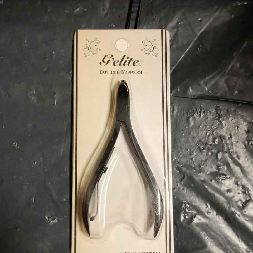 BOX OF APPROXIMATELY 40 CUTICLE NAIL CLIPPERS