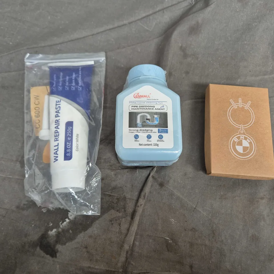 APPROXIMATELY 15 ASSORTED HOUSEHOLD PRODUCTS TO INCLUDE BMW KEYRING, PIPE DREDGING AGENT, WALL REPAIR PASTE ETC