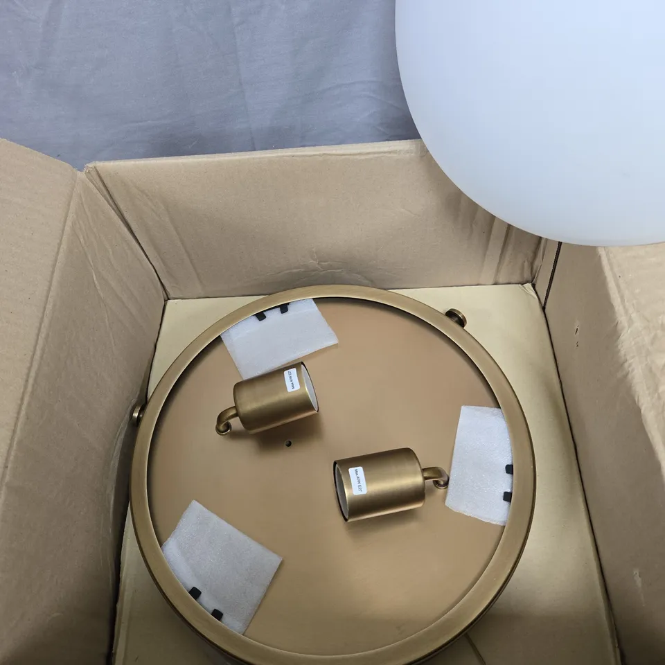 BRASS FINISH CEILING LIGHT FIXTURE WITH TWO ADJUSTABLE SPOTLIGHTS AND FROSTED GLOBE SHADE