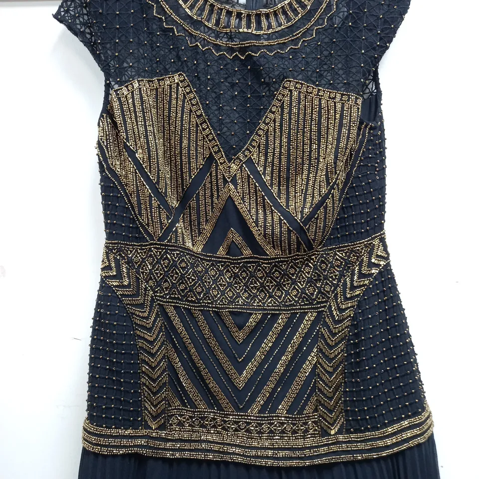 KAREN MILLEN EMBELLISHED PLEATED MAXI DRESS IN BLACK/GOLD - SIZE 12