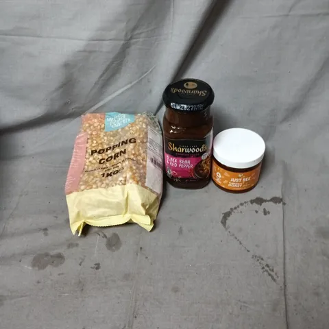 APPROXIMATELY 15 ITEMS OF ASSORTED HOUSEHOLD ITEMS INCLUDING SHARWOODS BLACK BEAN AND RED PEPPER SAUCE, WHOLE FOOD EARTH POPPING CORN AND JUST BEE TURMERIC HONEY