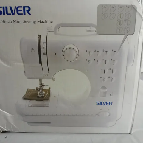 BOXED SILVER 12-STITCH MINI SEWING MACHINE