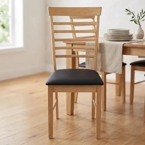 BOXED 2 X HANOVER NATURAL AND BLACK LIGHT OAK AND FAUX LEATHER LADDER BACK FLAT PACKED DINING CHAIR
