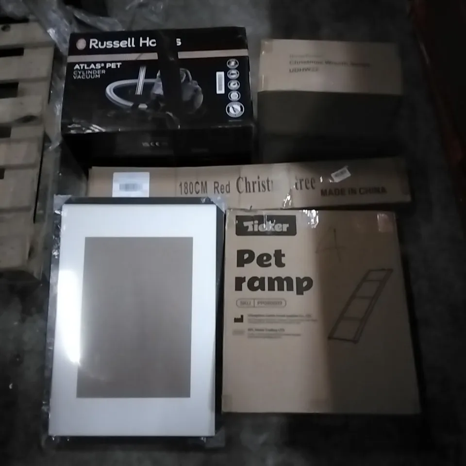 PALLET CONTAINING ASSORTED PRODUCTS INCLUDING PET RAMP, 180CM CHRISTMAS TREES, CHRISTMAS WREATH, PICTURE FRAMES & RUSSELL HOBBS CYLINDER VACUUM