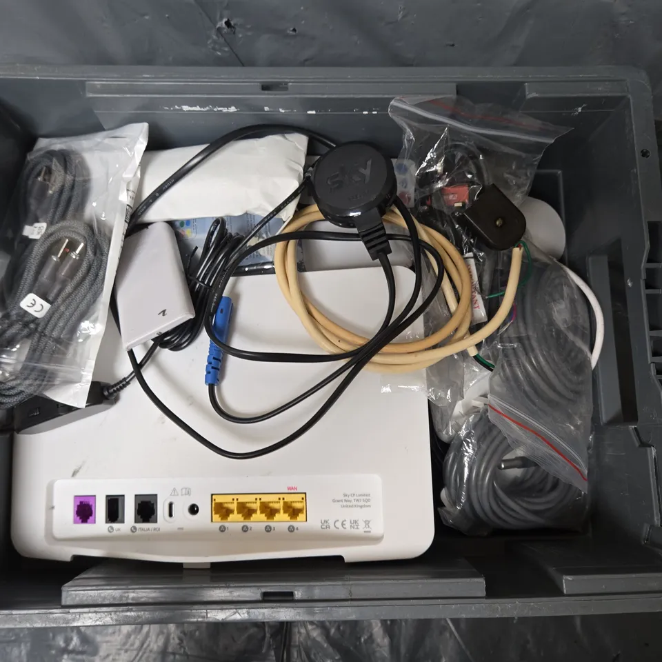 APPROXIMATELY 12 ASSORTED HOUSEHOLD ITEMS TO INCLUDE SKY BOX, TV REMOTES, CABLES, ETC