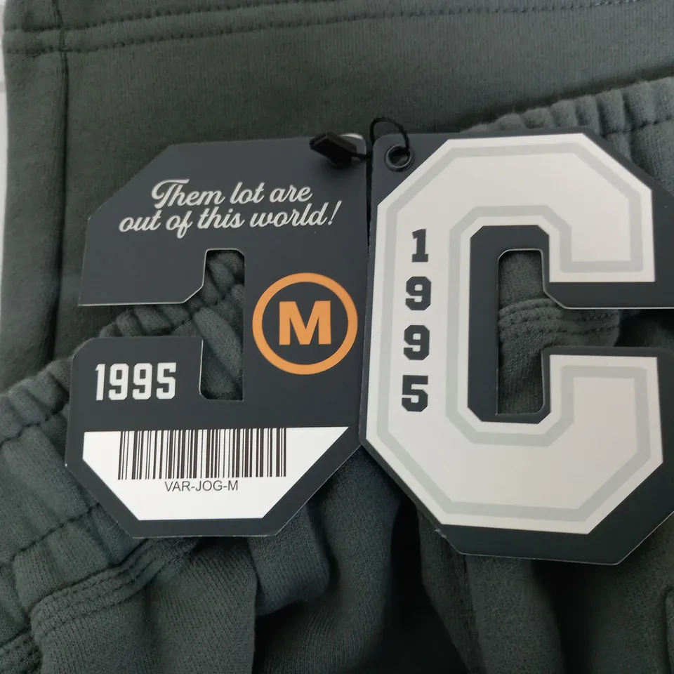CHILDISH 1995 JOGGERS IN GREEN - M