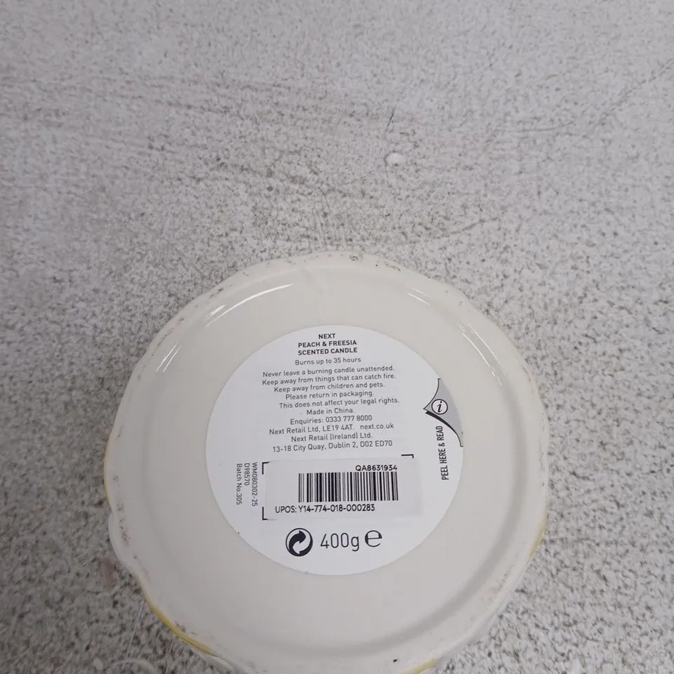 NEXT PEACH AND FREESIA SCENTED CANDLE 400G