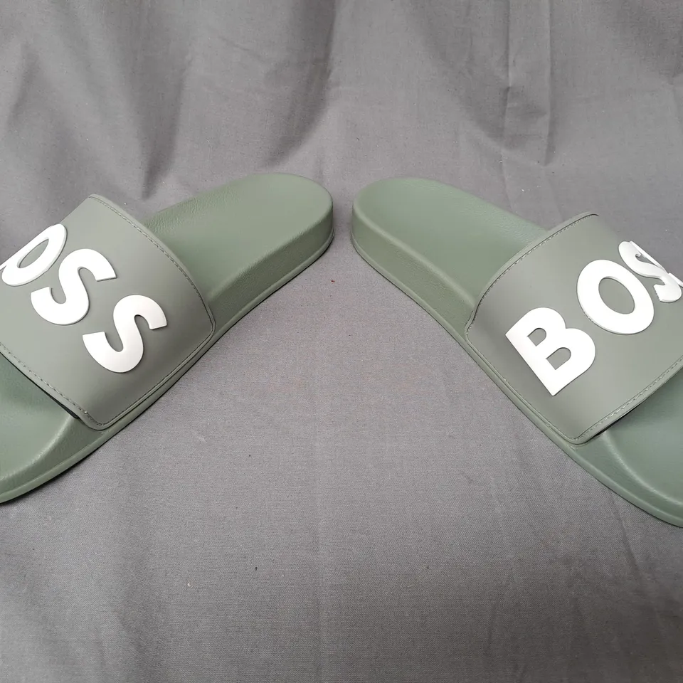 PAIR OF BOSS SLIDERS IN OLIVE GREEN EU SIZE 43