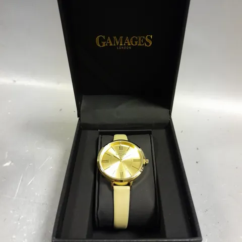 GAMAGES JUBILANT GOLD CHAMPAGNE WATCH
