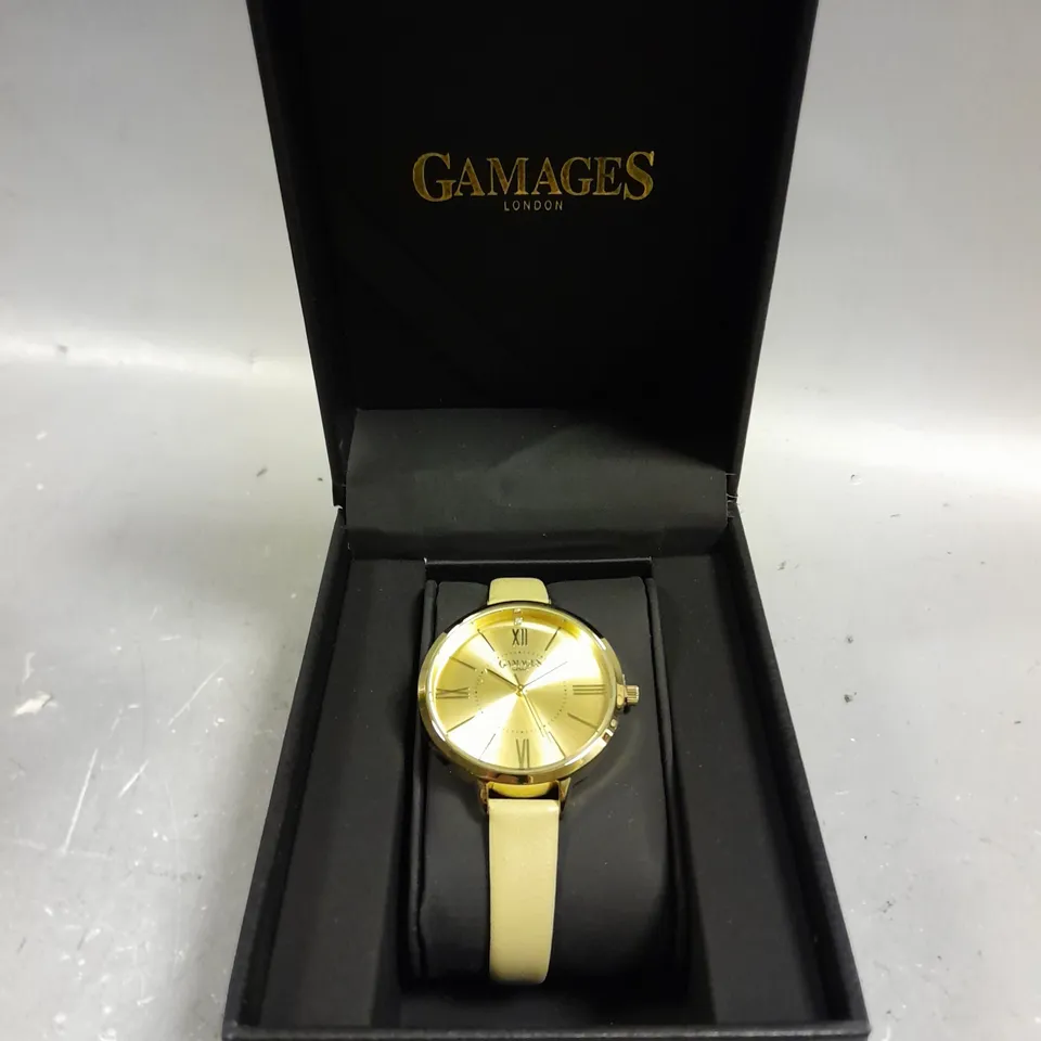 GAMAGES JUBILANT GOLD CHAMPAGNE WATCH 
