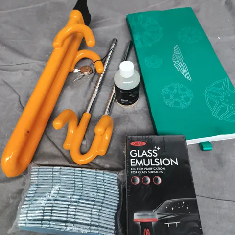 APPROXIMATELY 10 ASSORTED VEHICLE PARTS/ACCESSORIES TO INCLUDE WHEEL LOCK, GLASS EMULSION, ASTON MARTIN DECORATIONS ETC 