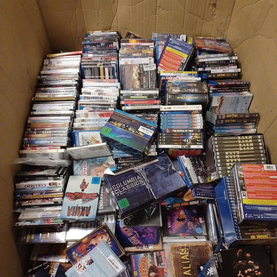 PALLET OF APPROXIMATELY 400 ASSORTED NEW AND USED DVDS FROM VARIOUS REGIONS - COLLECTION ONLY 