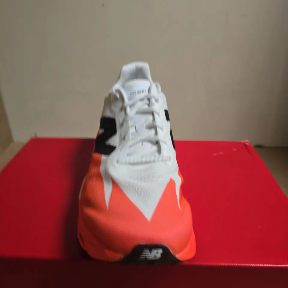 BOXED PAIR OF NEW BALANCE RUNNING SHOES ENERGY ARC, WHITE/ORANGE, UK 11.5