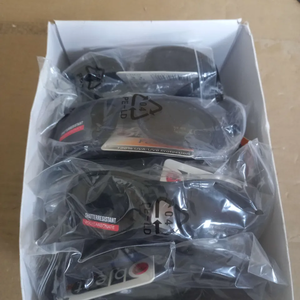 BOX OF APROX 100 SUN GLASSES IN VERSUS DESIGN AND COLOR