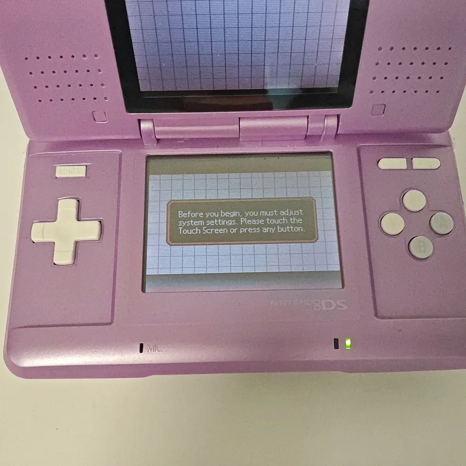 UNBOXED NINTENDO DS IN PURPLE/WHITE WITH SPYRO ADVENTURE - NTR-001