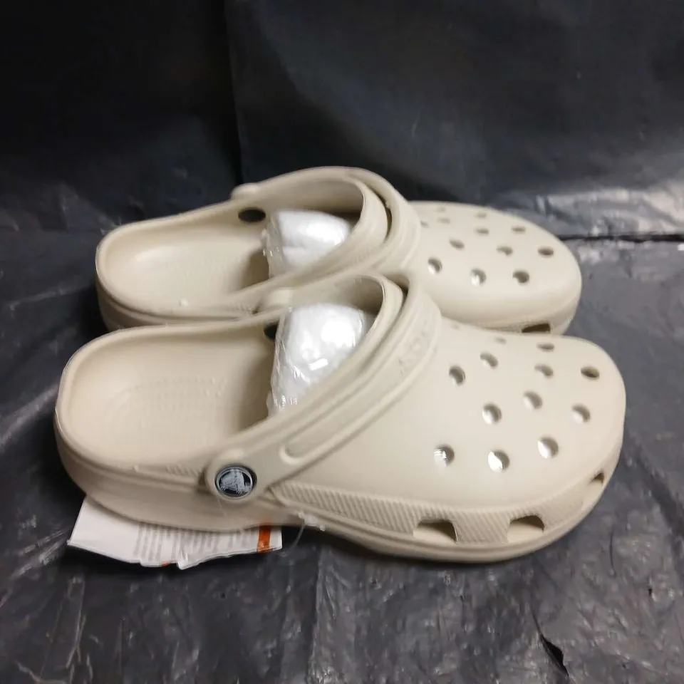 PAIR OF CROCS CLASSIC CLOG – BEIGE - UK SIZE UNSPECIFIED
