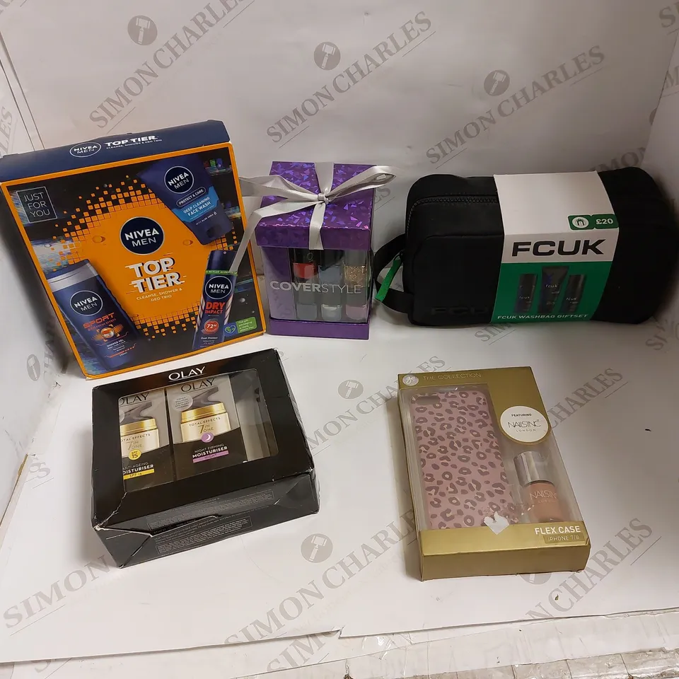 LOT OF APPROXIMATELY 10 COSMETIC GIFTSET TO INCLUDE COVERSTYLE GLOSS, NIVE MEN TOP TIER, AND OLAY COSMETICS ETC. 