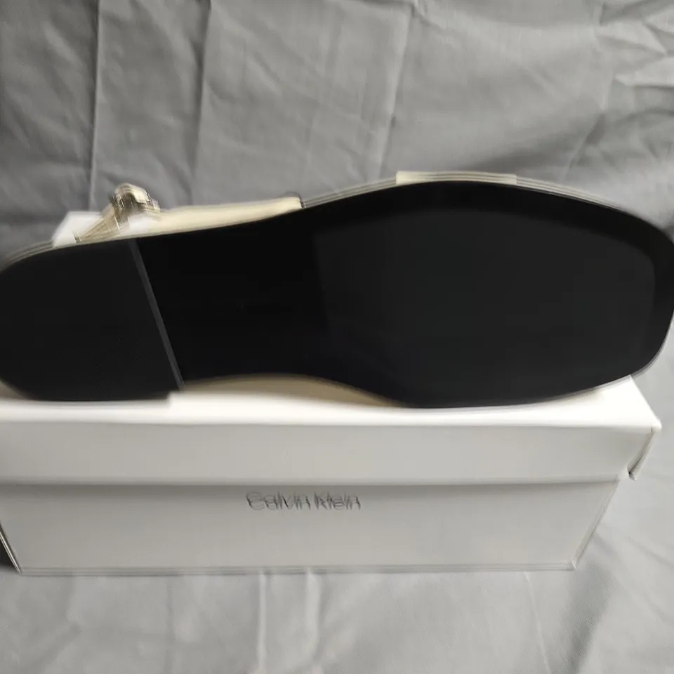 BOXED PAIR OF CALVIN KLEIN FLAT SANDALS - UK SIZE 38
