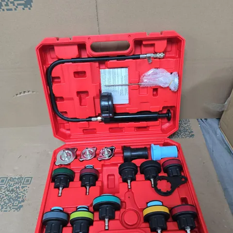 AUTOMOTIVE TOOL KIT IN RED CASE WITH INFLATOR HOSE AND VALVE ADAPTERS