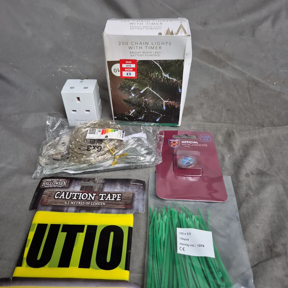APPROXIMATELY 15 ASSORTED HOUSEHOLD ITEMS TO INCLUDE GREEN CABLE TIES, 200 CHAIN LIGHTS WITH TIMER AND WEST HAM UNITED PIN BADGE