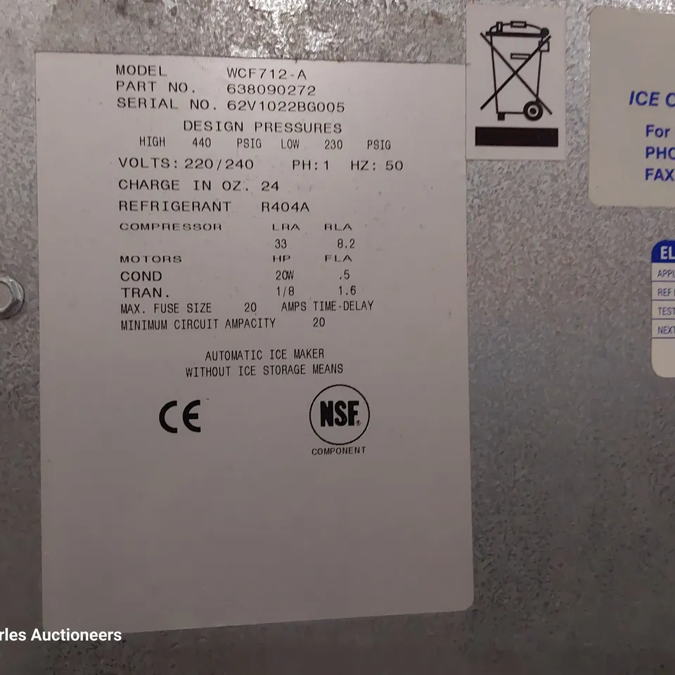 FOLLETT COMMERCIAL ICE MACHINE ON STAND WITH ICE TROLLEY