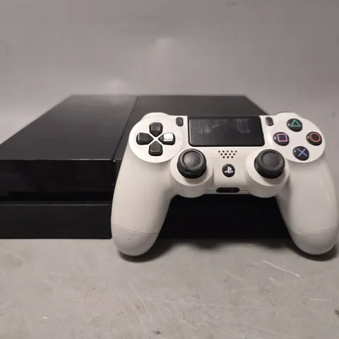 PLAYSTATION 4 CONSOLE IN BLACK WITH CONTROLLER