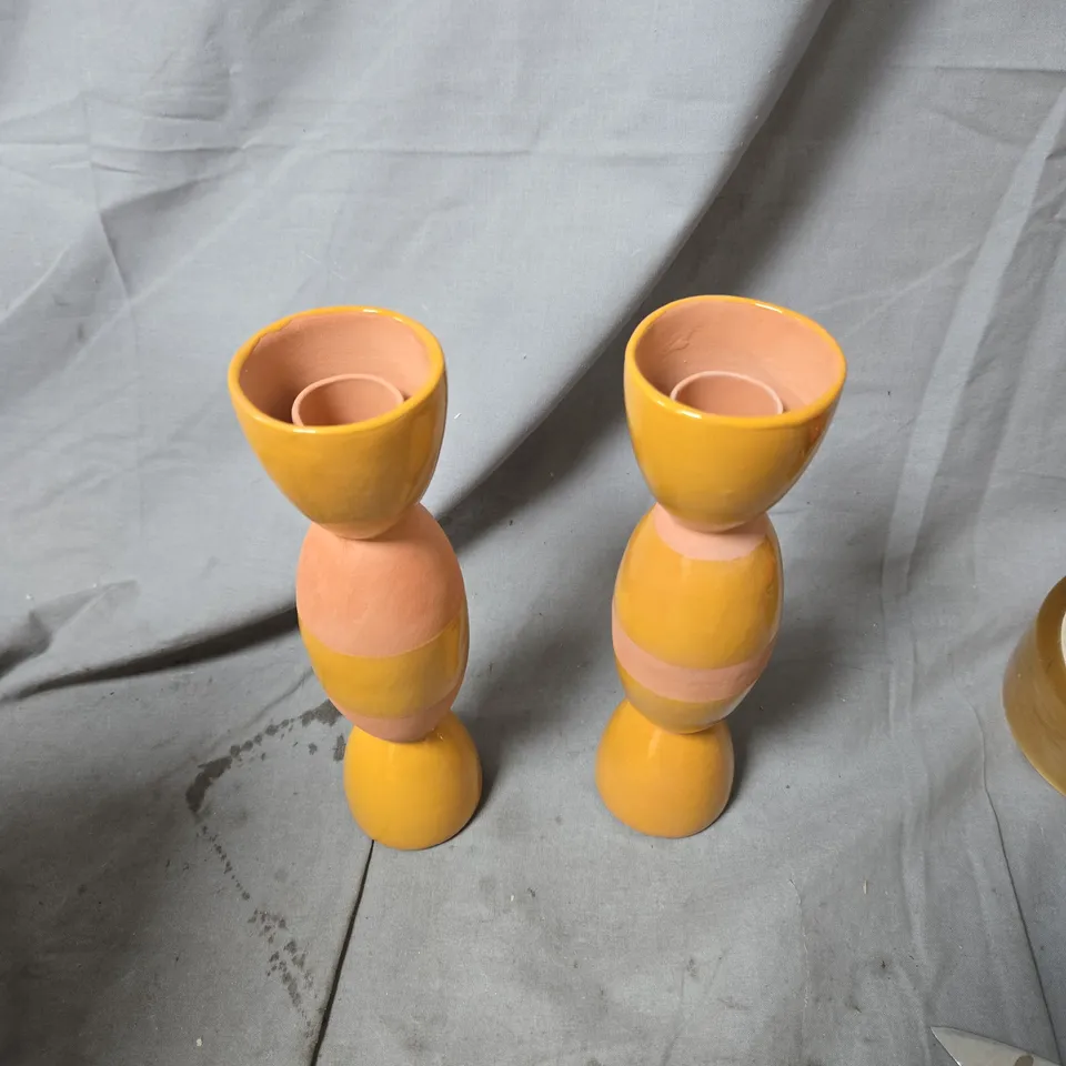 SET OF TWO TOTEM CANDLE HOLDERS 