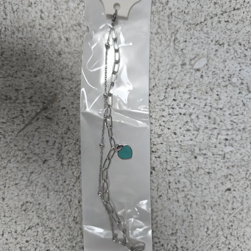 TIFFANY & CO. STAINLESS STEEL NECKLACE WITH TURQUOISE HEART CHARM