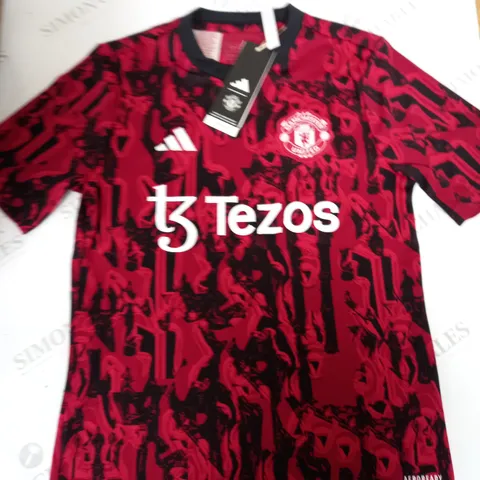 MANCHESTER UNITED FC TRAINING TOP SIZE 11-12 YEARS