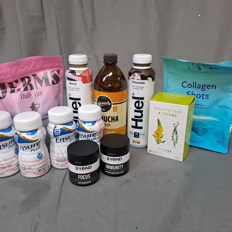 APPROXIMATELY 12 ASSORTED FOOD AND DRINK PRODUCTS TO INCLUDE REMEDY KOMBUCHA GINGER LEMON, JERMS DAILY GUT, HUEL, ENSURE PLUS, MULLEIN LEAF & THYME NUTRA TEA