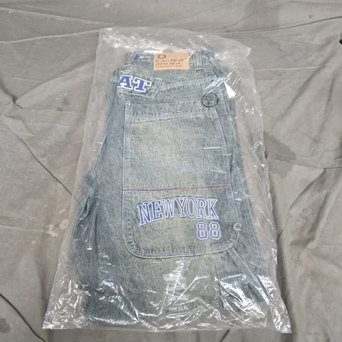 D NON DENIM JEANS WEAR SKATEBOARD JEANS WITH NEW YORK 88 PATCH IN WASHED BLUE - 34W 33.5L