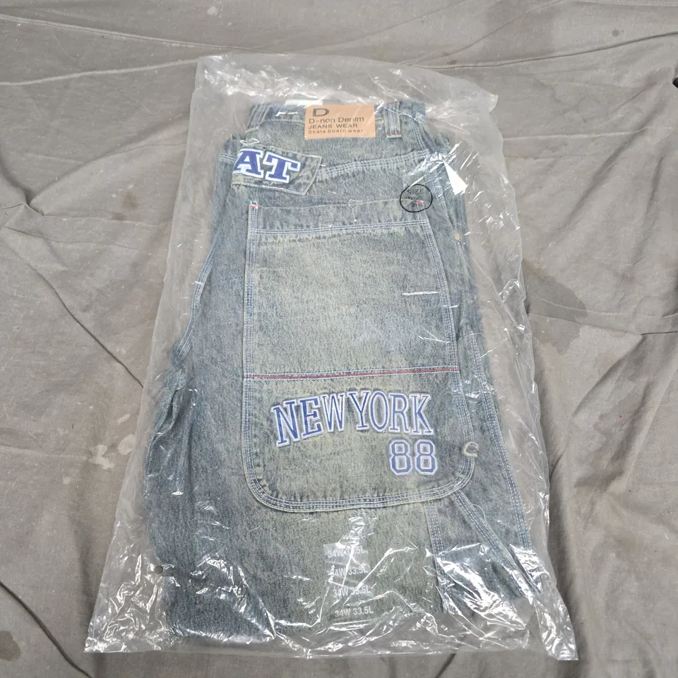 D NON DENIM JEANS WEAR SKATEBOARD JEANS WITH NEW YORK 88 PATCH IN WASHED BLUE - 34W 33.5L