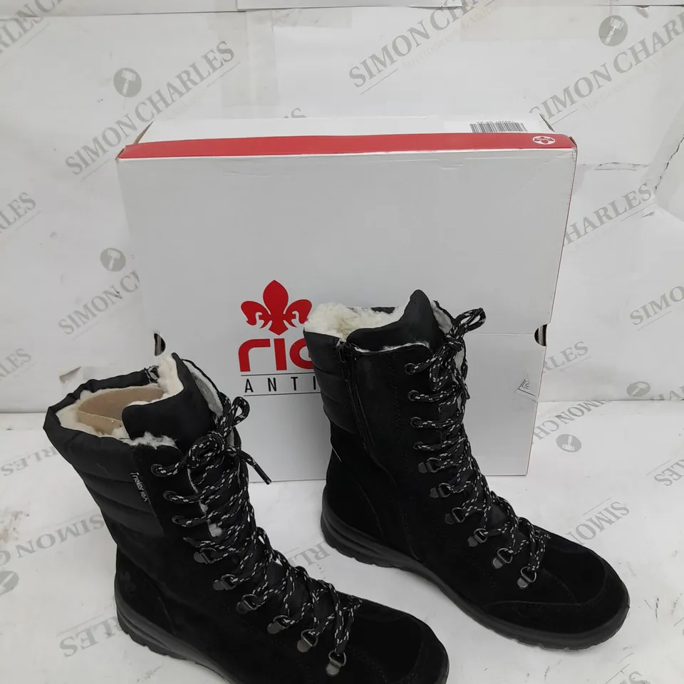 BOXED PAIR OF RIEKER SUEDE WATER RESISTANT BOOTS IN BLACK SIZE 5