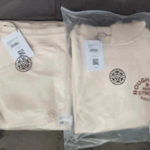 BOX OF APPROXIMATELY 12 ASSORTED BRASS MONKEY CLOTHING ITEMS TO INCLUDE HOODIES AND JOGGERS IN OFF WHITE - SIZES VARY