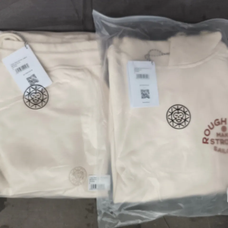 BOX OF APPROXIMATELY 12 ASSORTED BRASS MONKEY CLOTHING ITEMS TO INCLUDE HOODIES AND JOGGERS IN OFF WHITE - SIZES VARY