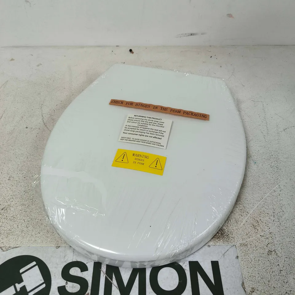 SEALED WHITE OVAL TOILET SEAT