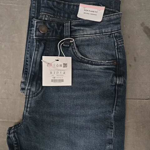 PULL & BEAR KICK FLARE FIT MID RISE JEANS IN DARK BLUE SIZE UK 6