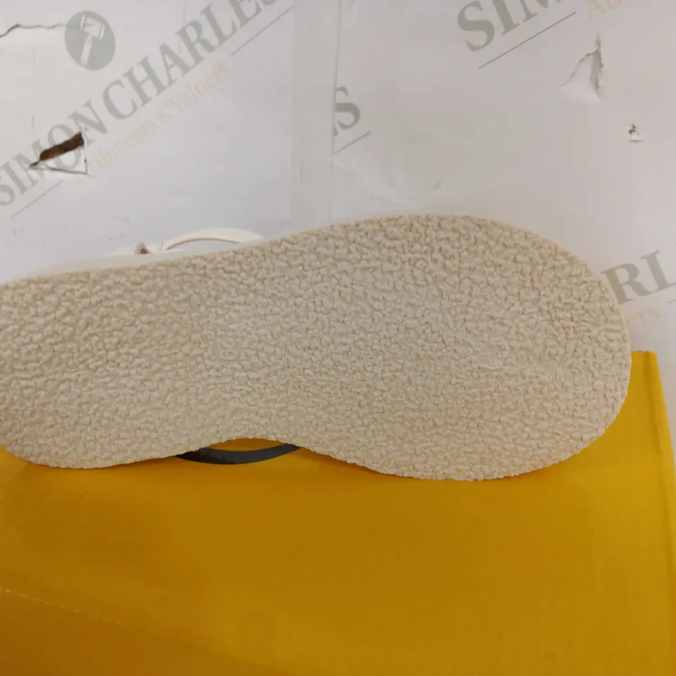 BOXED PAIR OF DESIGNER REAR-ZIPPED SANDALS IN CREAM - SIZE UNSPECIFIED