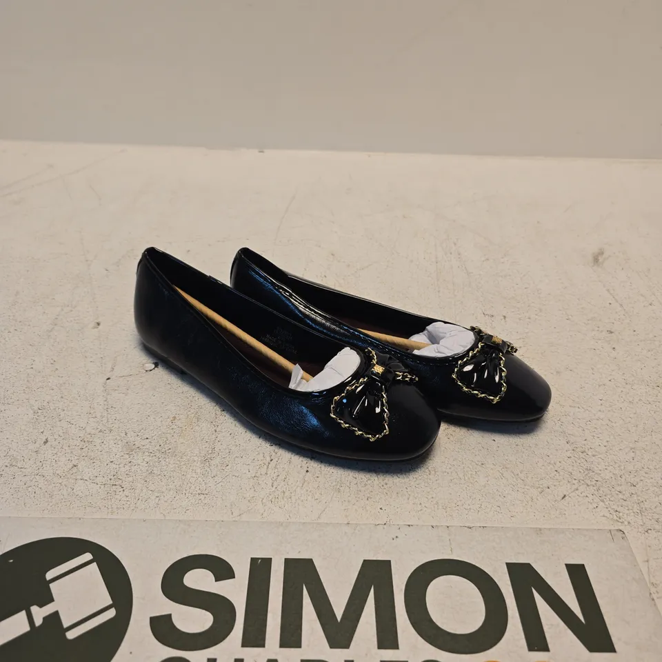 RIVER ISLAND BLACK PATENT BOW FLATS – UK4