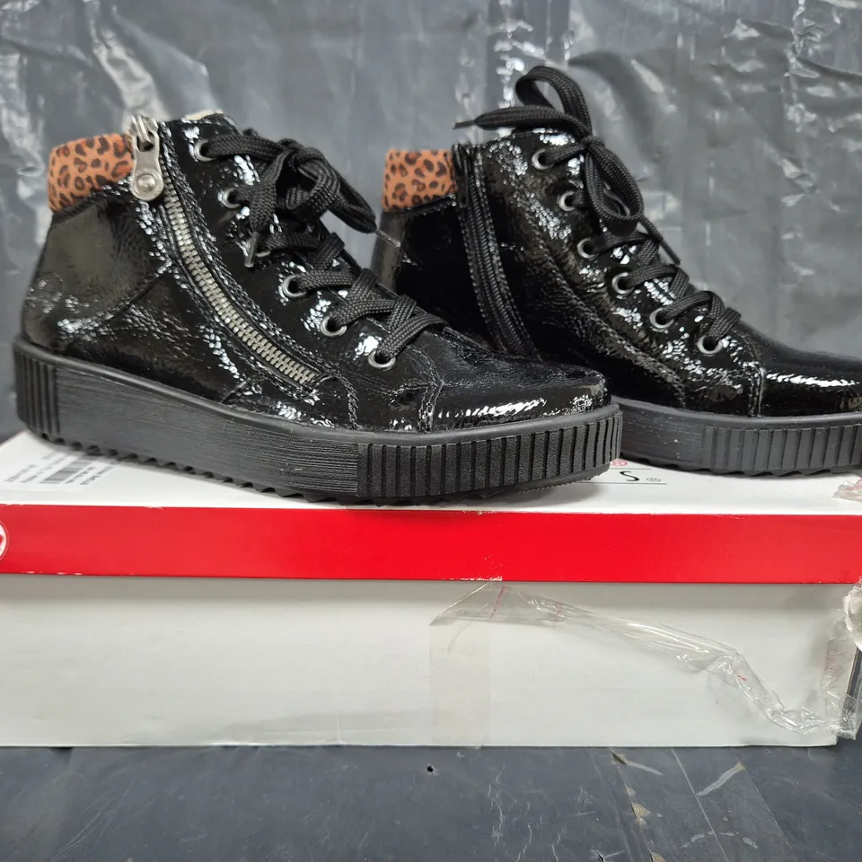 BOXED PAIR OF RIEKER HI TOP TRAINERS IN BLACK SIZE 5