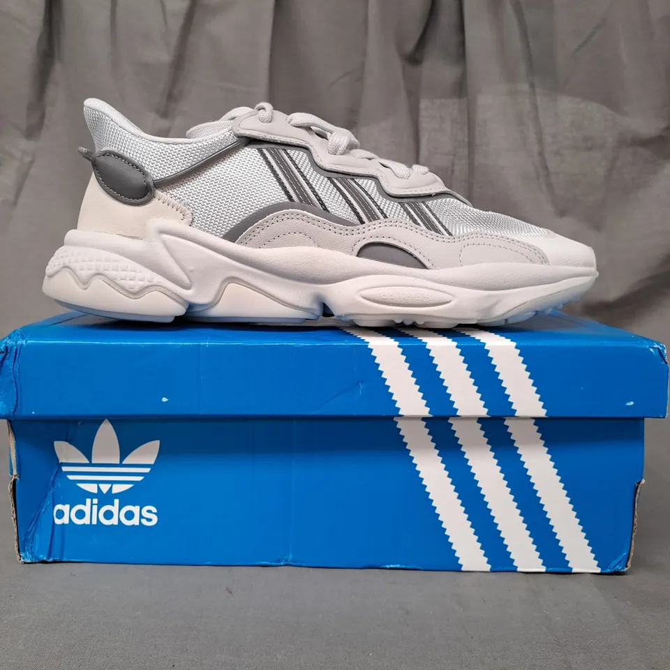 BOXED PAIR OF ADIDAS OZWEEGO SHOES IN GREY UK SIZE 9