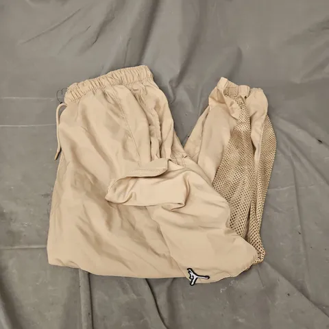 JORDAN POCKET TRACK PANTS IN LIGHT TAN SIZE XL
