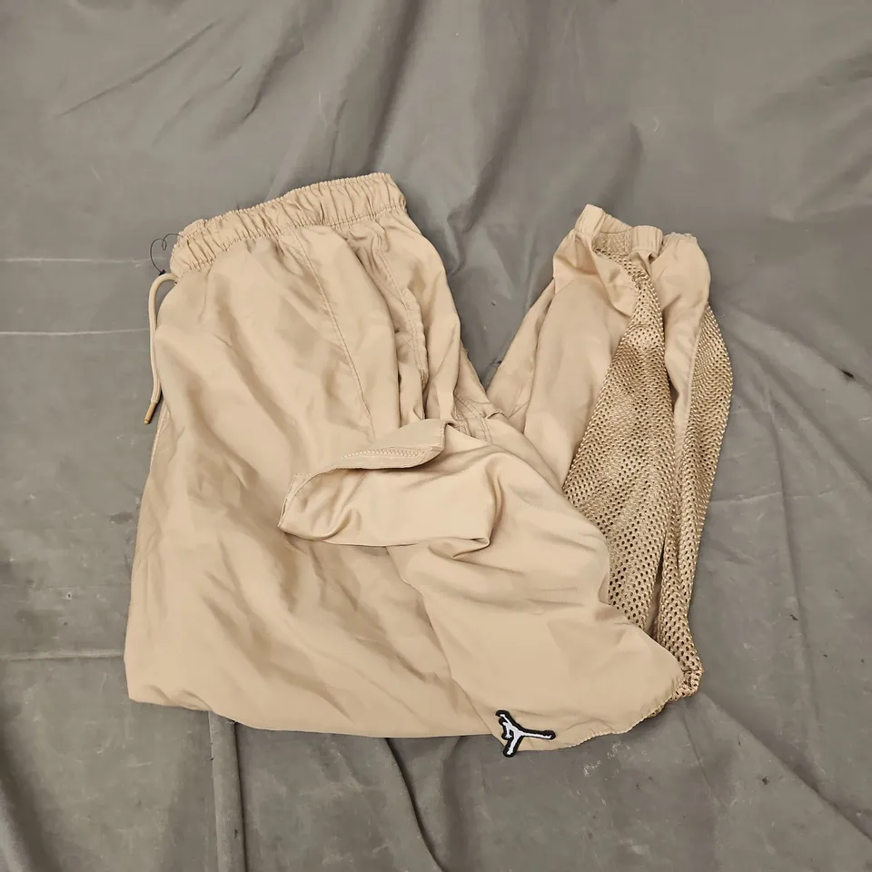 JORDAN POCKET TRACK PANTS IN LIGHT TAN SIZE XL