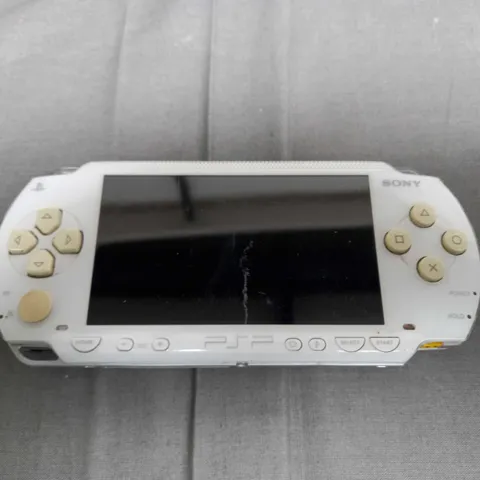SONY PLAYSTATION PORTABLE HANDHELD GAMES CONSOLE