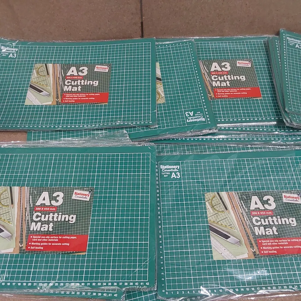 BOX CONTAINING APPROXIMATELY 28x BRAND NEW A3 CUTTING MATS, 1x COLOUR THERAPY SET, 1x FLAG