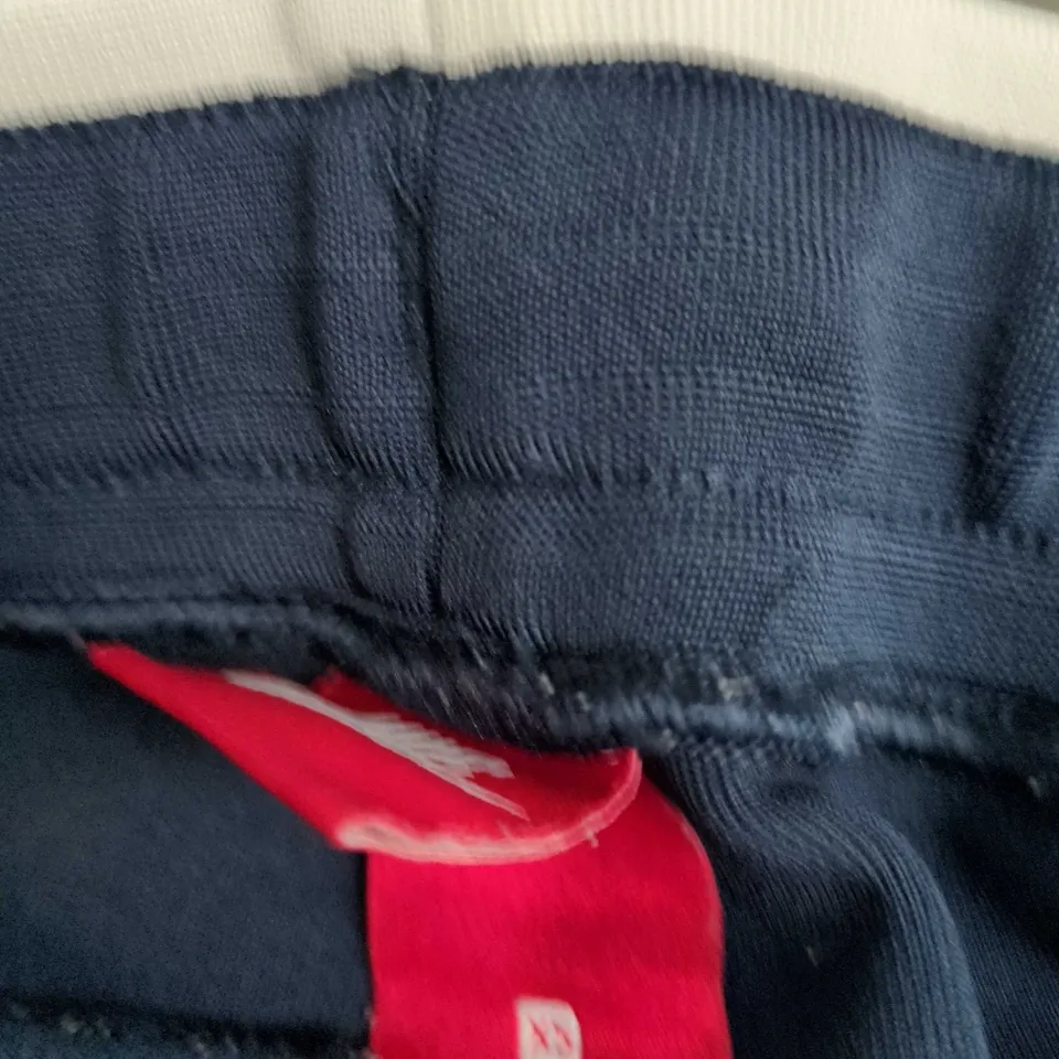 NIKE SPORTSWEAR TRACK PANTS - NAVY WITH LIGHT BLUE PANELS - SIZE XS