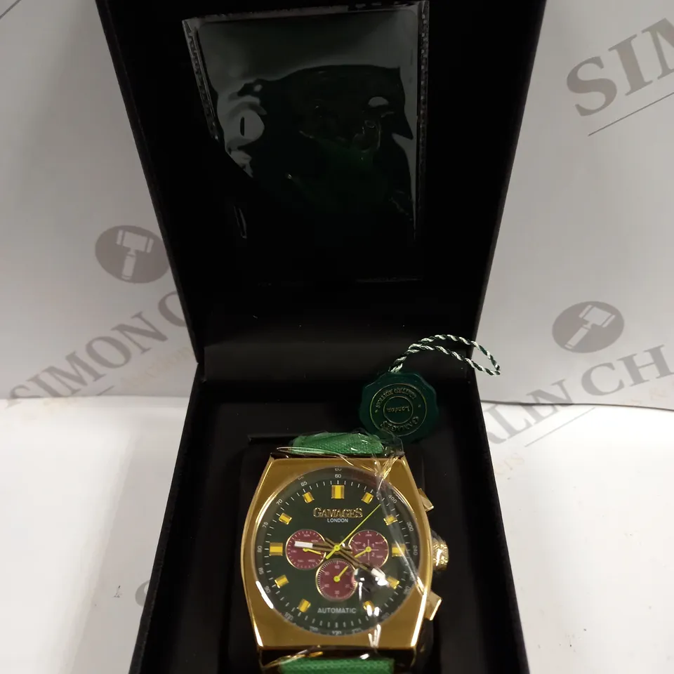 BOXED GAMAGES RETRO CALIBRE GOLD EFFECT CASE GREEN STRAP WATCH 