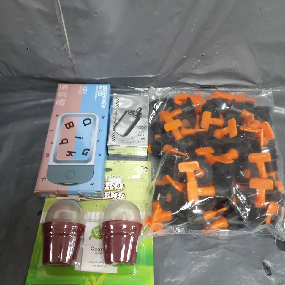 APPROXIMATELY 10 ASSORTED HOUSEHOLD ITEMS TOO INCLUDE MAGNIFYING GLASS , NOSE TRIMMER , PICTURE FRAME , ETC 