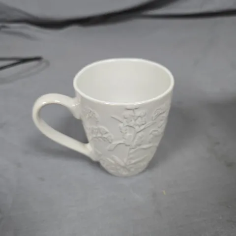 SET OF FOUR MUGS